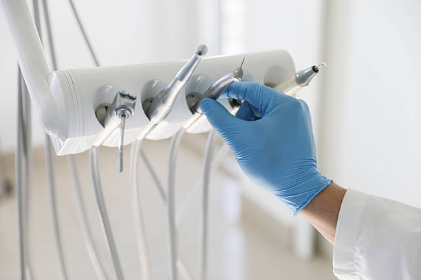 Professional Tooth Extraction technician working in Doña Ana County County, NM